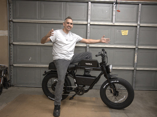 a man sitting on e-bike trooper 01